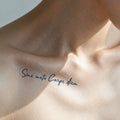 Script semi-permanent tattoo reading "Sine metu Carpe diem" applied on the collarbone